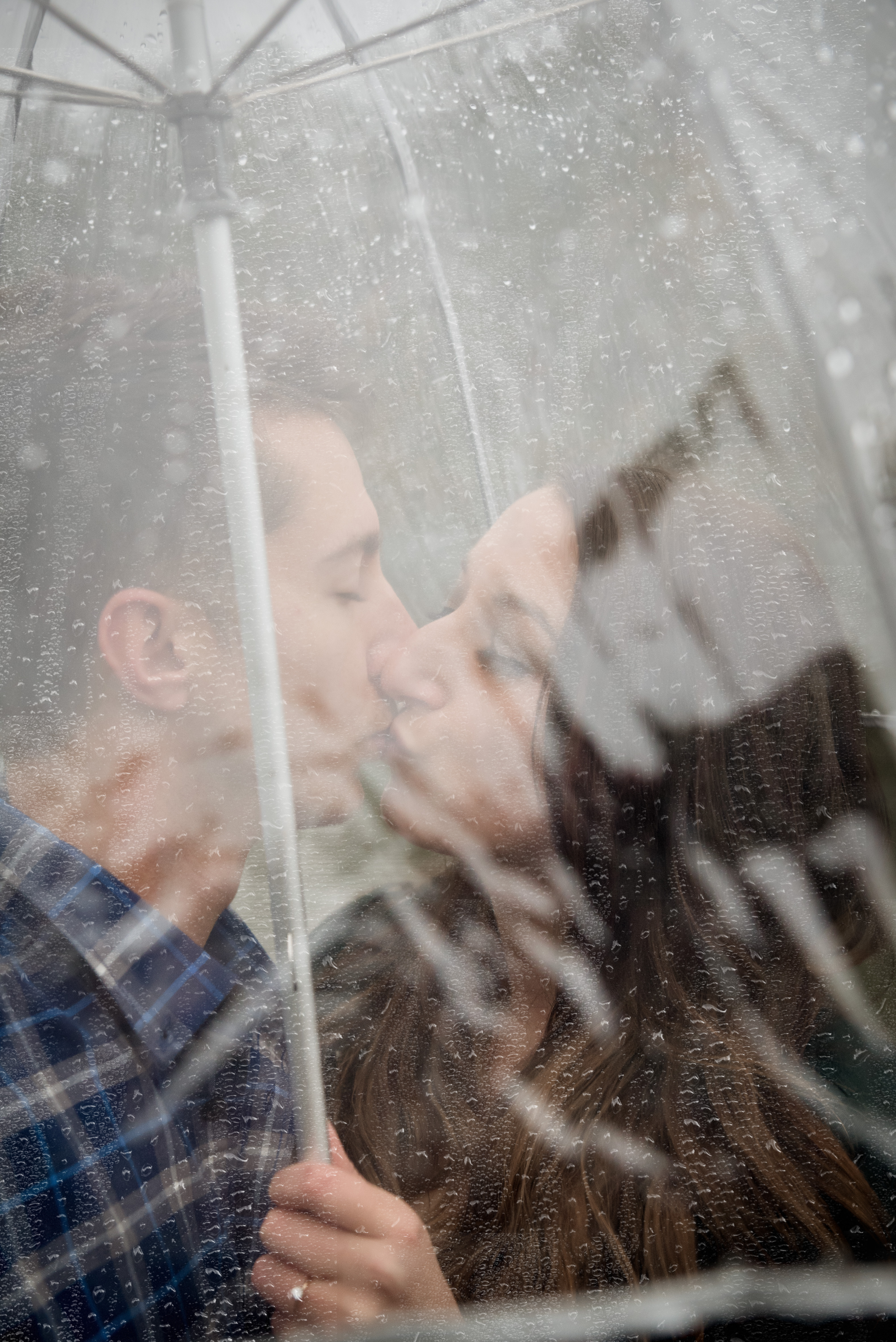 wet rainy day engagement photography in Athens, Ohio