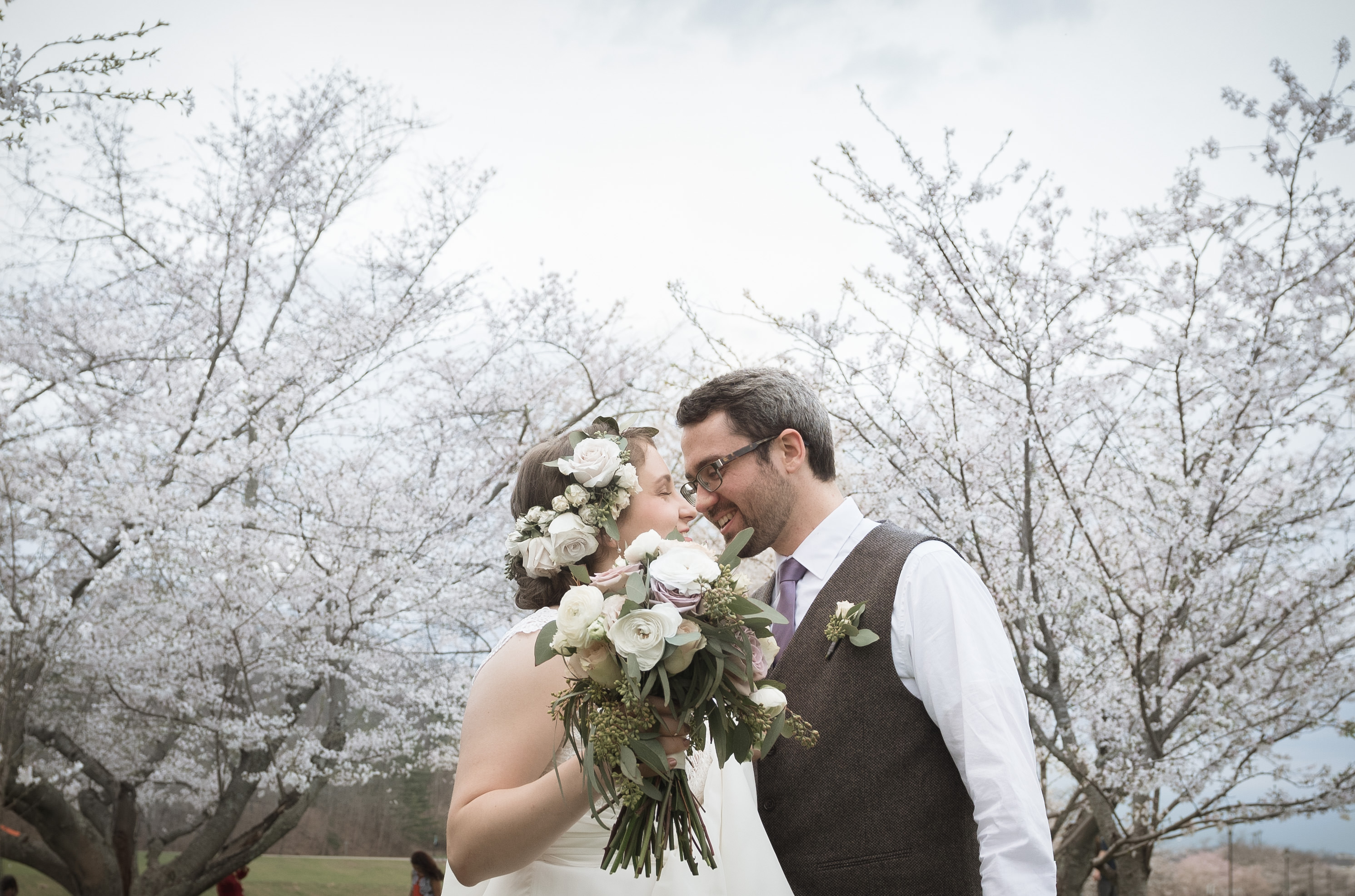 beautiful photography with bride and groom under cherry trees in athens ohio with photographer