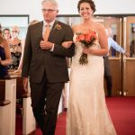 Bride and dad walking down aisle at Granville Chapel or New Hope Lutheran Church