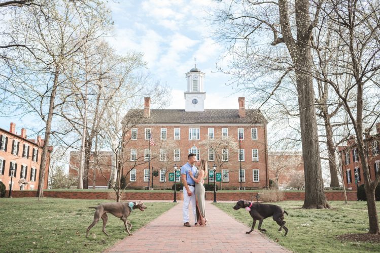 dogs and couple in front of culter hall at Ohio University in Athens