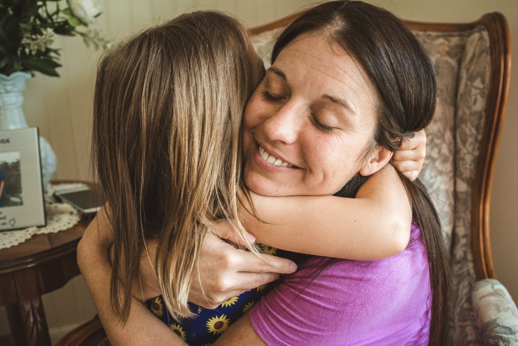 mother and daughter embrace in Athens Ohio